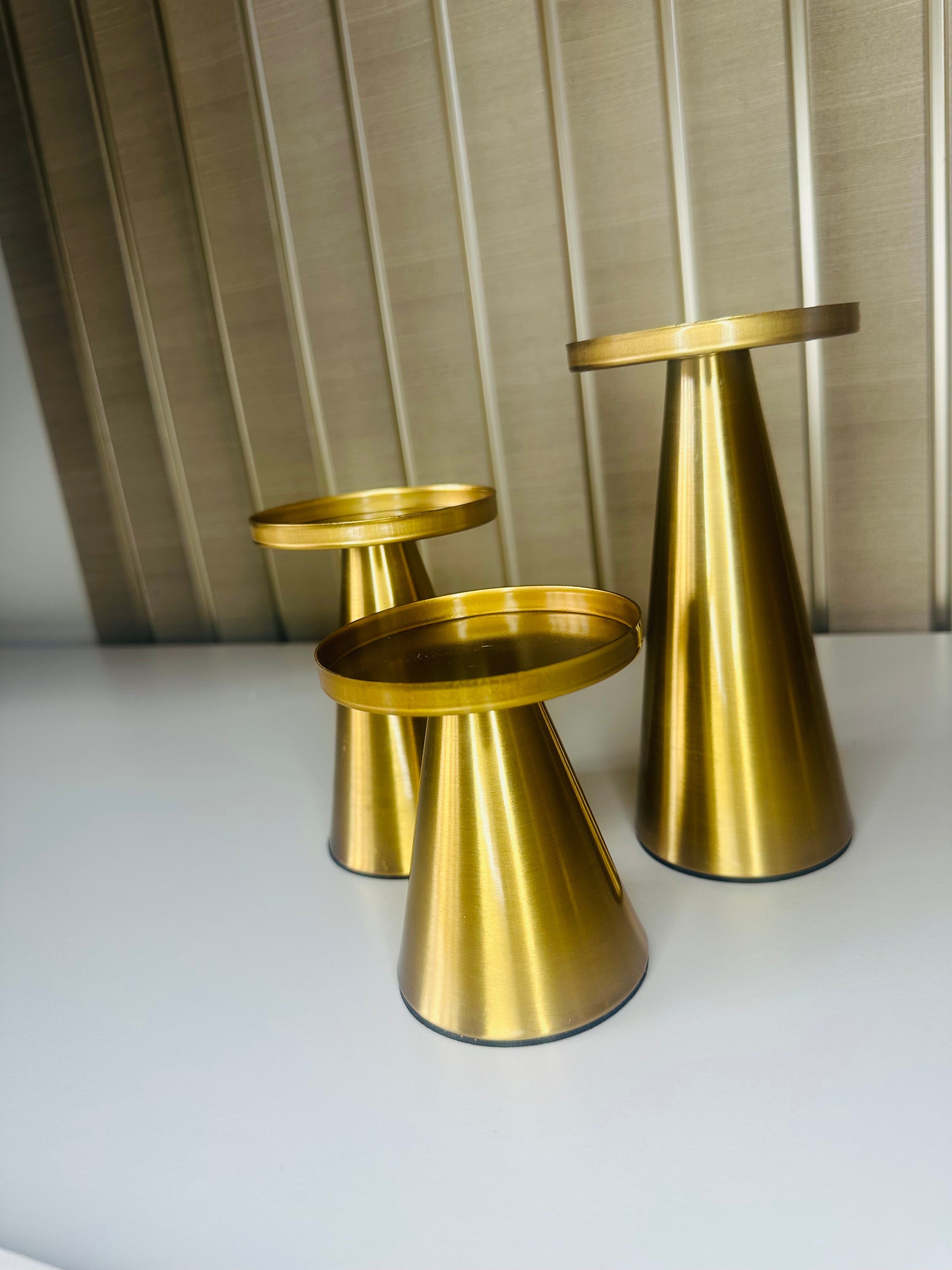 Koperen set gouden kandelaren