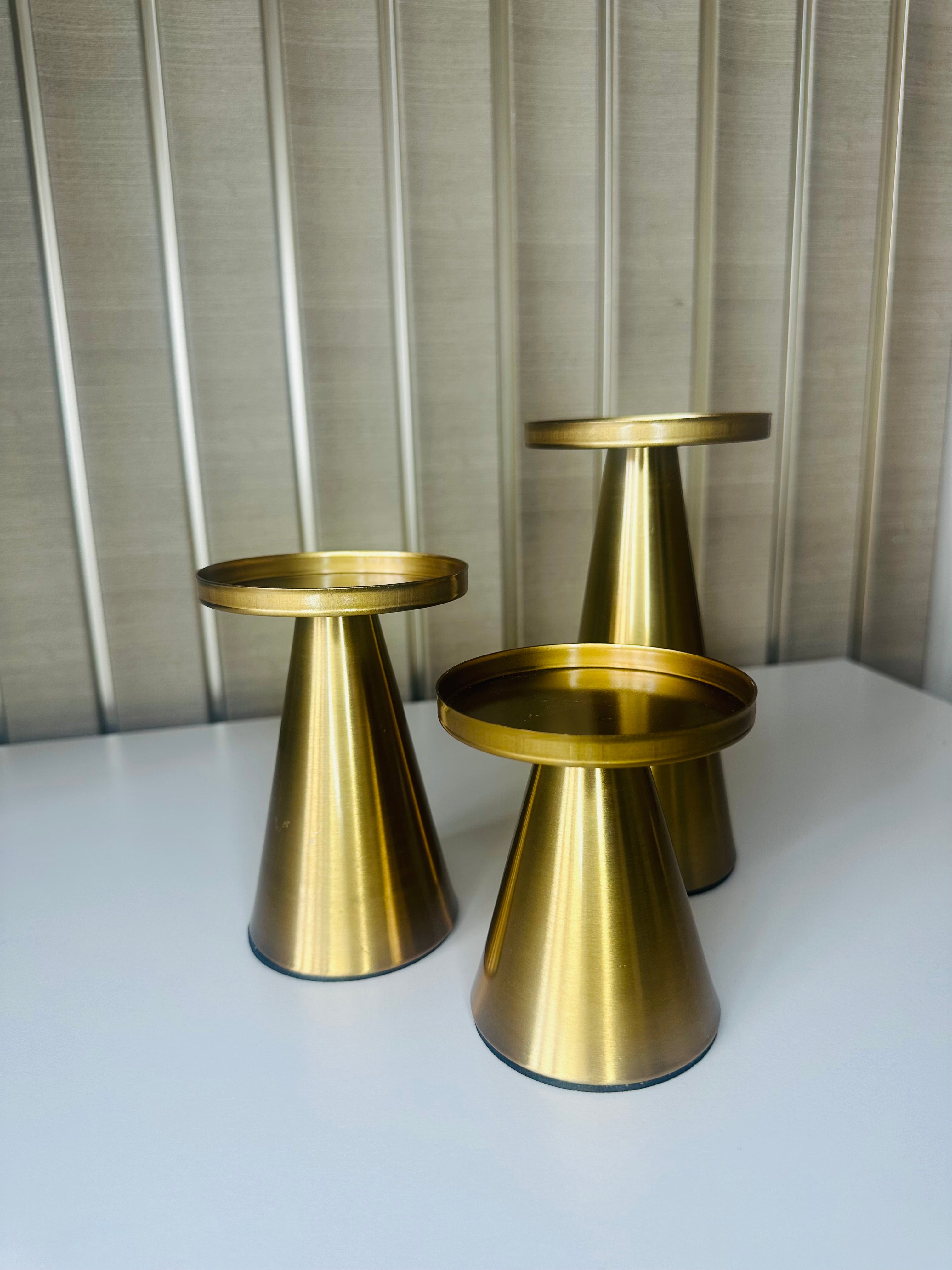 Koperen set gouden kandelaren