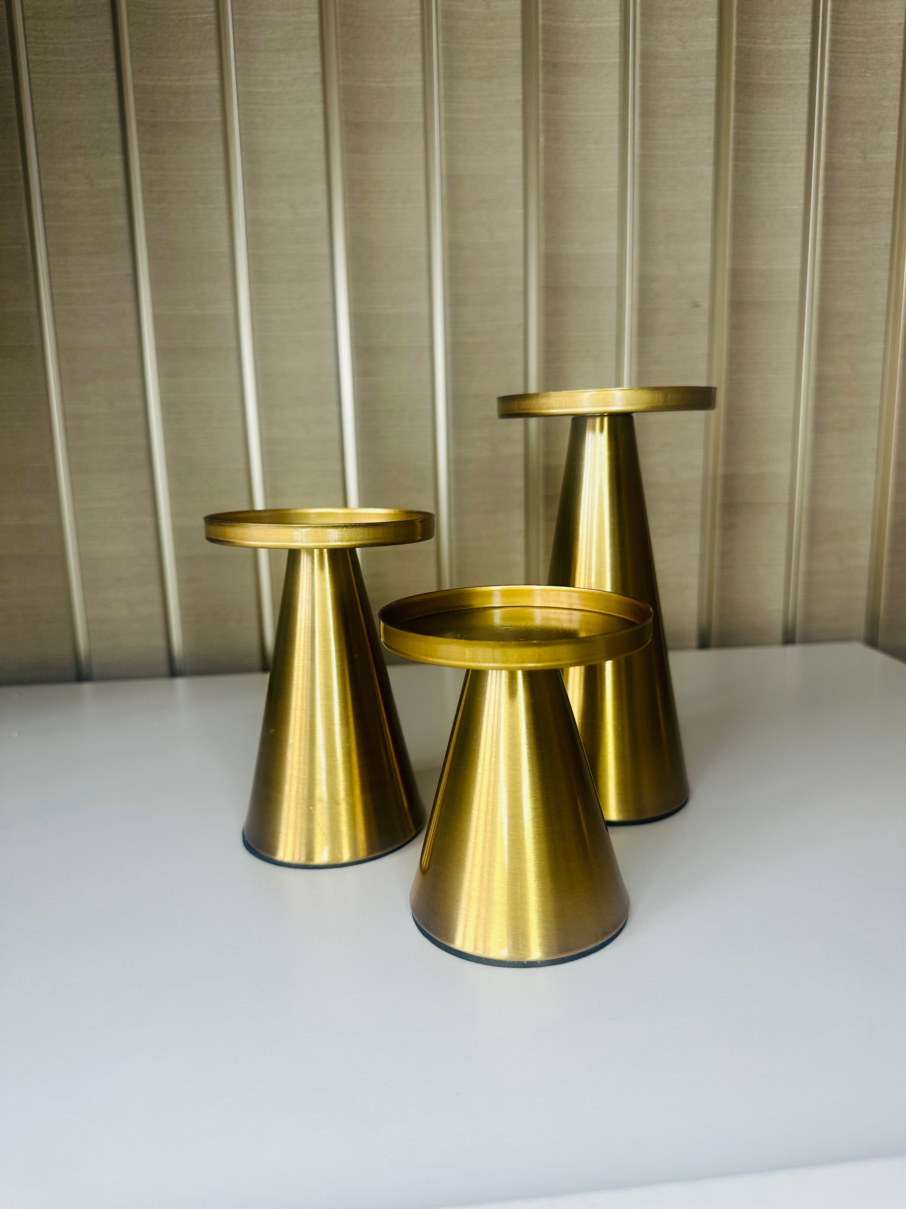 Koperen set gouden kandelaren