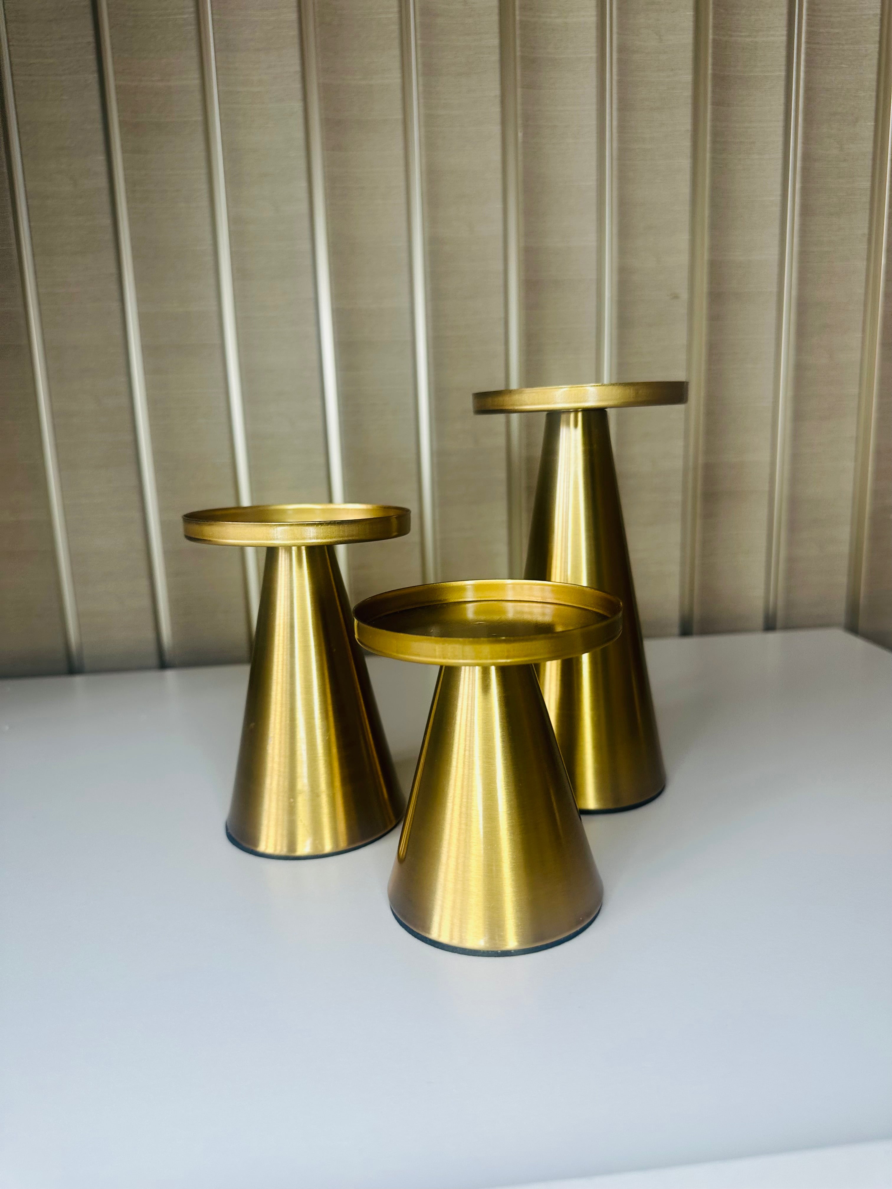 Koperen set gouden kandelaren
