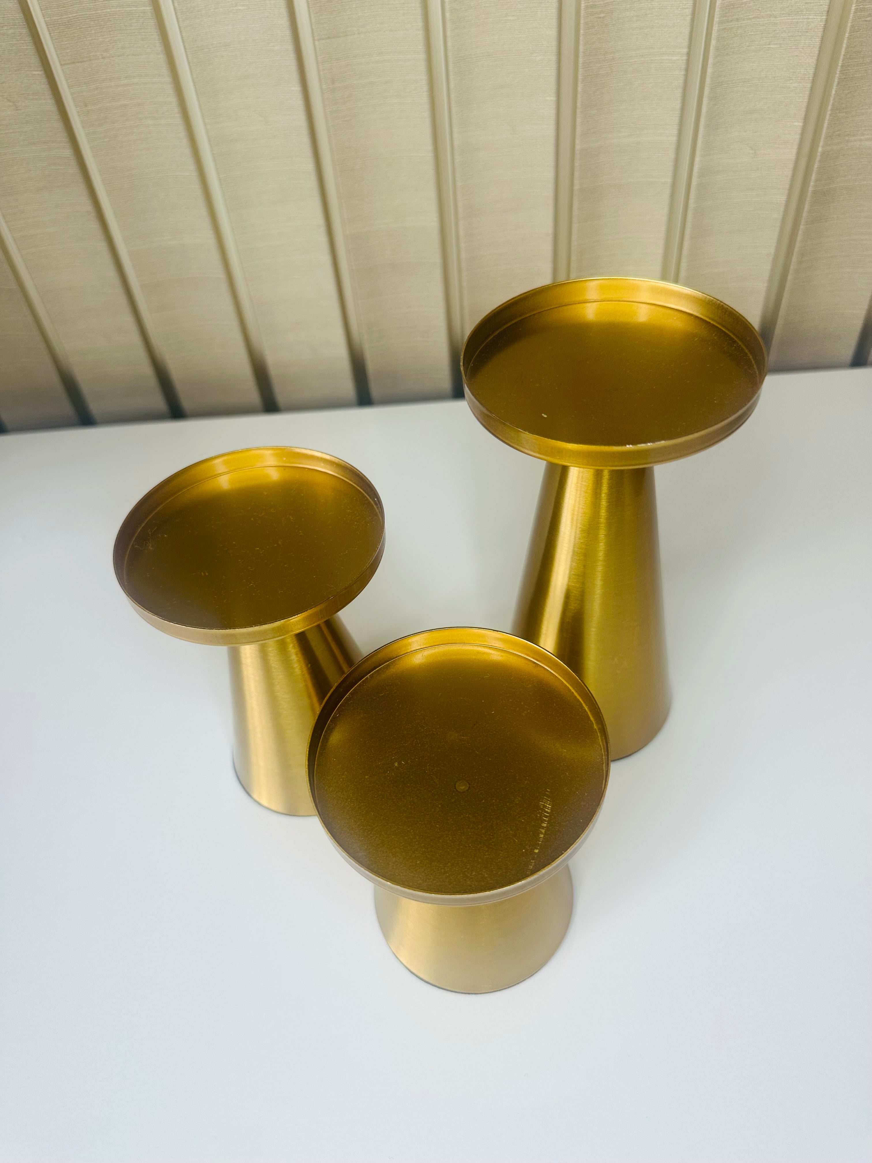 Koperen set gouden kandelaren