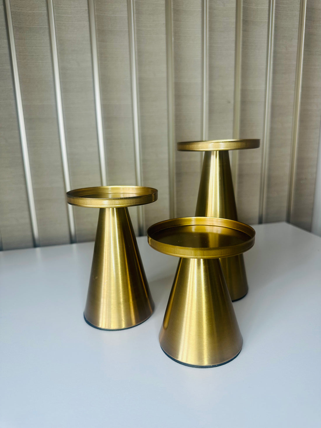 Koperen set gouden kandelaren