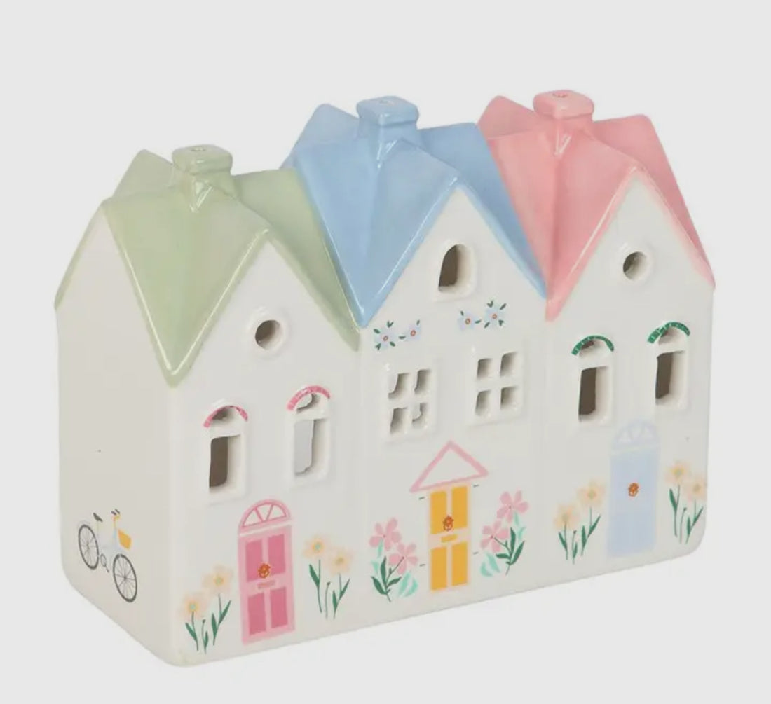 Pastel huis wierookkegelbrander en theelichthouder